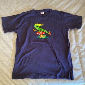 Embroidered ‘alien jumping overr mushroom’ Navy size: L